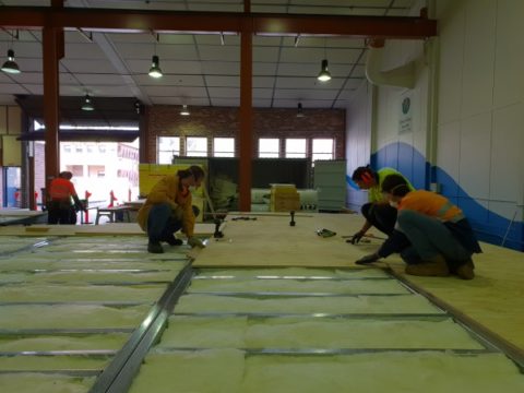 Installing plywood floor panels- Team UOW Desert Rose House Construction